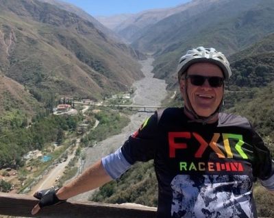 Andy Cotnam Cycling on the  tour with redspokes